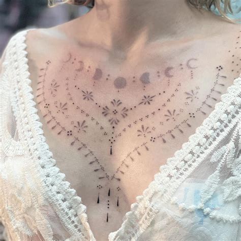 50 Striking Chest Tattoo Designs for Women